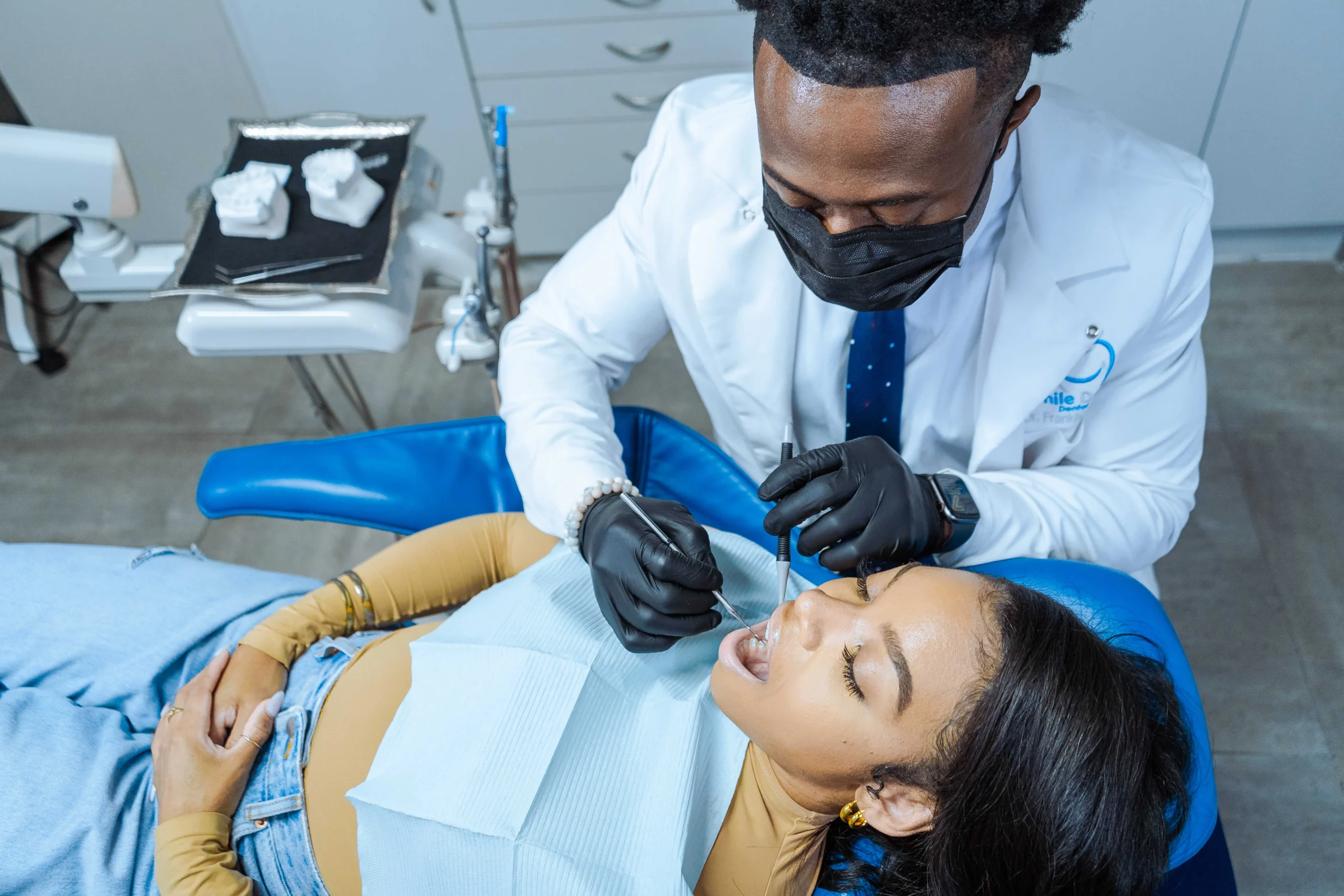 Photo of Doctor Aguebor educating a patient